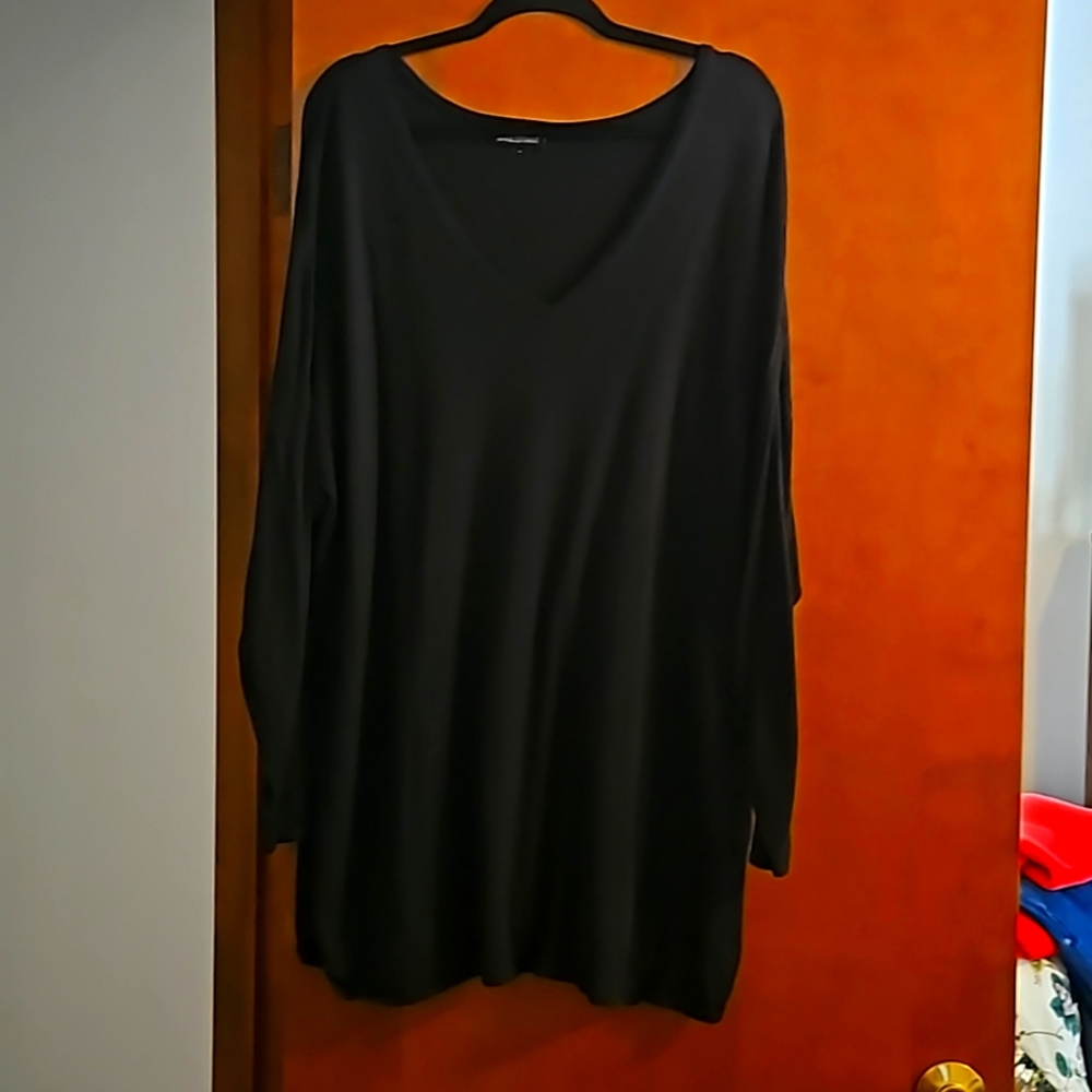 Light weight,deep vneck,long sleeve sweater. 26in. pit to pit. 34 long